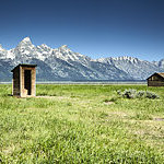 Wooden outhouse and barn in Mormon Row, Grand Teton National Park, USA.