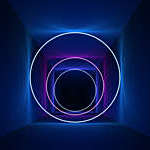 Digitally generated ring-shaped neon lights give a depth effect to a flat surface.